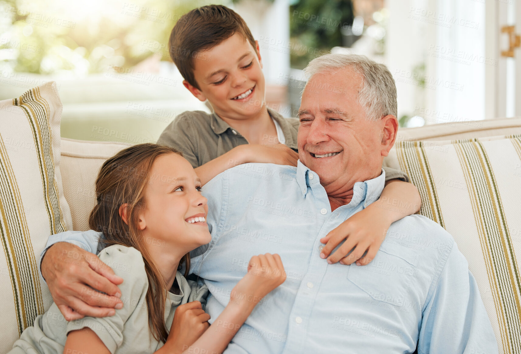 Buy stock photo Smile, grandfather and hug children in home for connection, care and people bonding. Happy, kids and embrace grandparent for love, support and family generations relax in living room with siblings