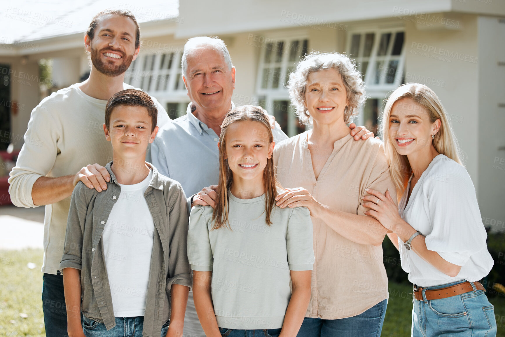 Buy stock photo Happy, portrait and family generations in backyard of new home for bonding, connection and security. Love, smile and children with parents and grandparents by outdoor garden at house in Switzerland.