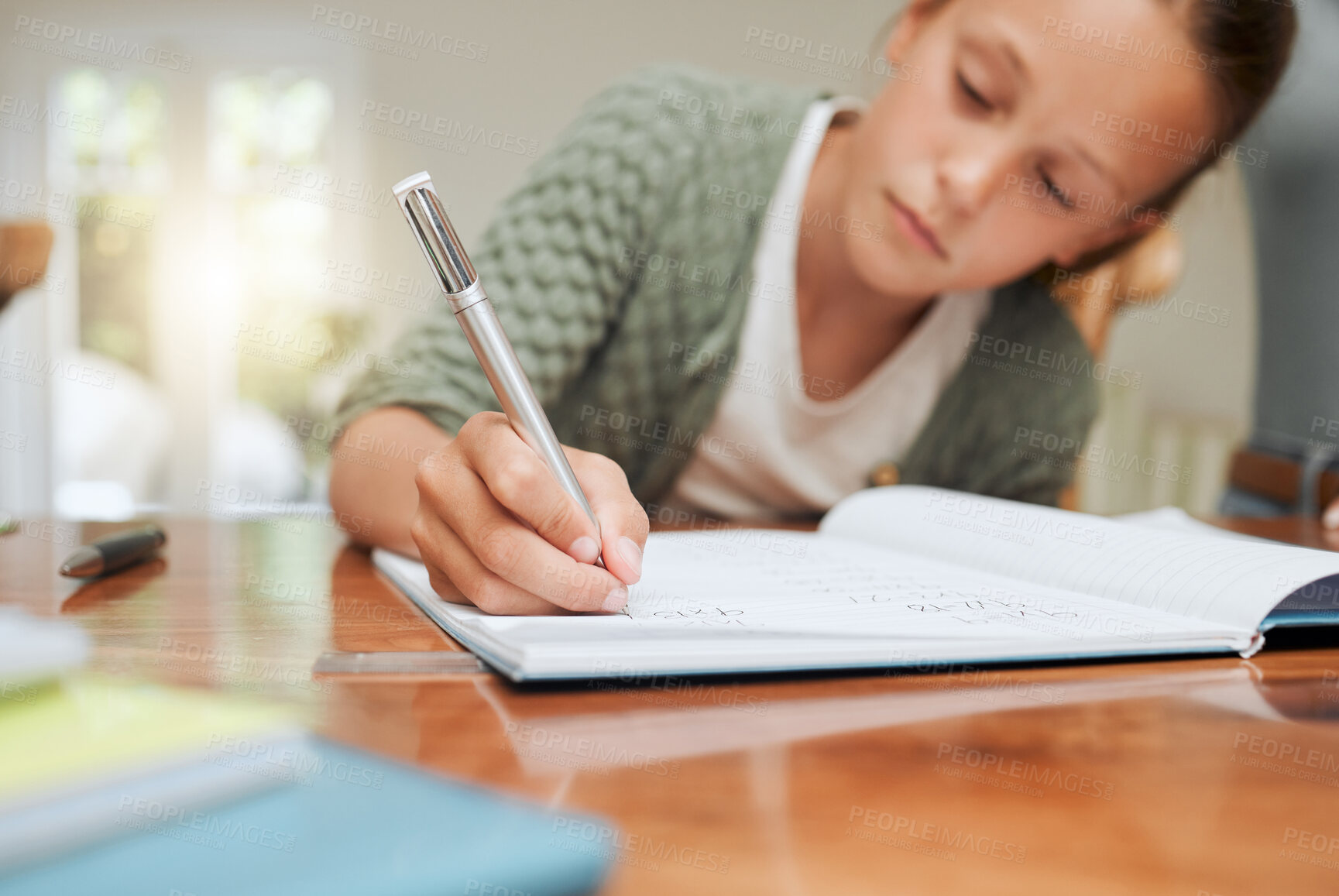 Buy stock photo Learning, hand or child writing math equation to study, knowledge or test preparation in home school. Homework, girl or kid with pen for numbers, education or problem solving on notebook for solution