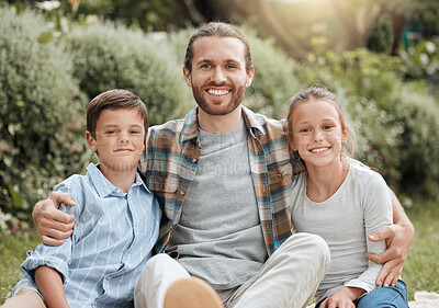 Buy stock photo Shot of a father posing with his children outside