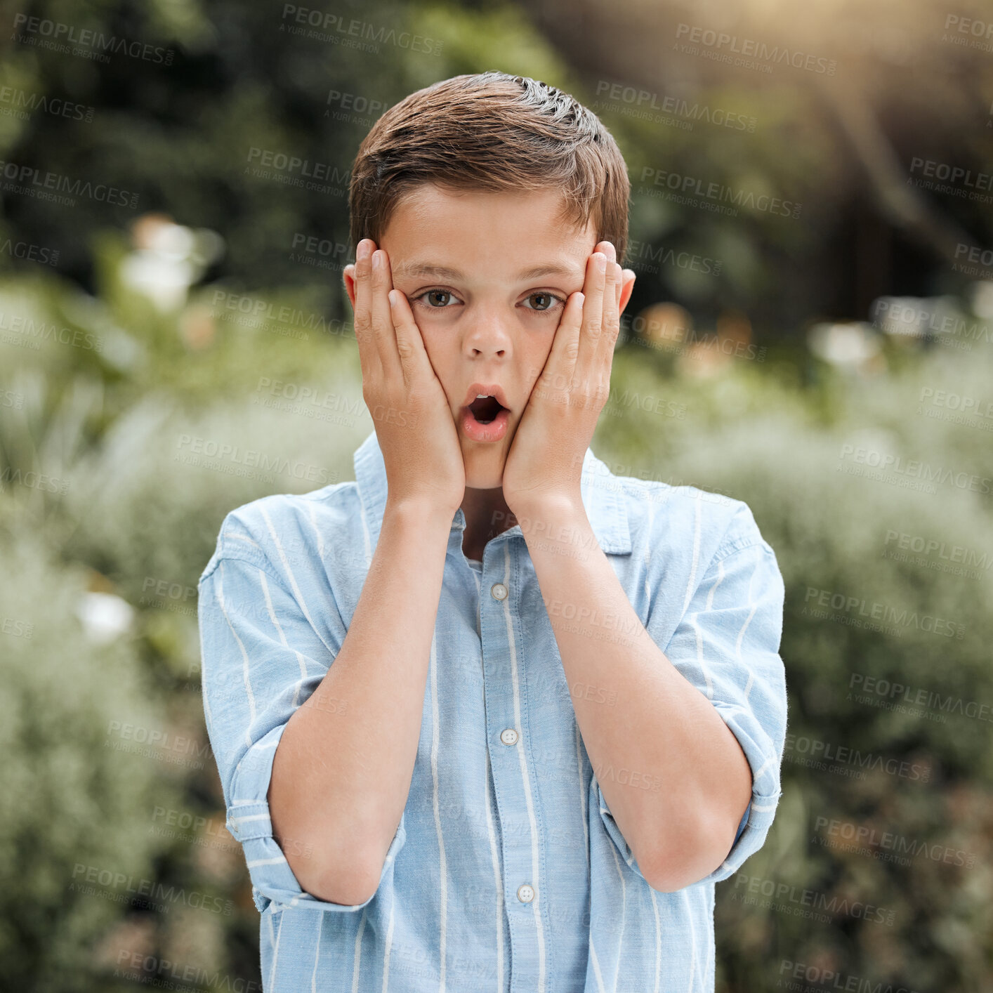 Buy stock photo Child, boy and shocked and playful with portrait, excited and outdoor for surprise, fun and joy in garden or backyard. Male person, kid and expression for freedom, creative and positive in Australia