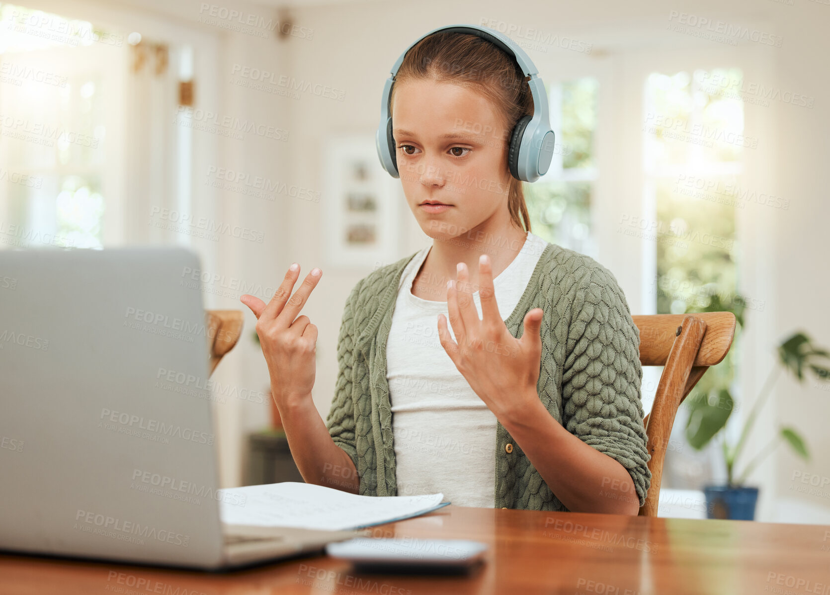 Buy stock photo Girl, hands and laptop with headphones for mathematics, online class or counting at home. Young student, female person or child with computer for virtual lesson, education or remote learning at house