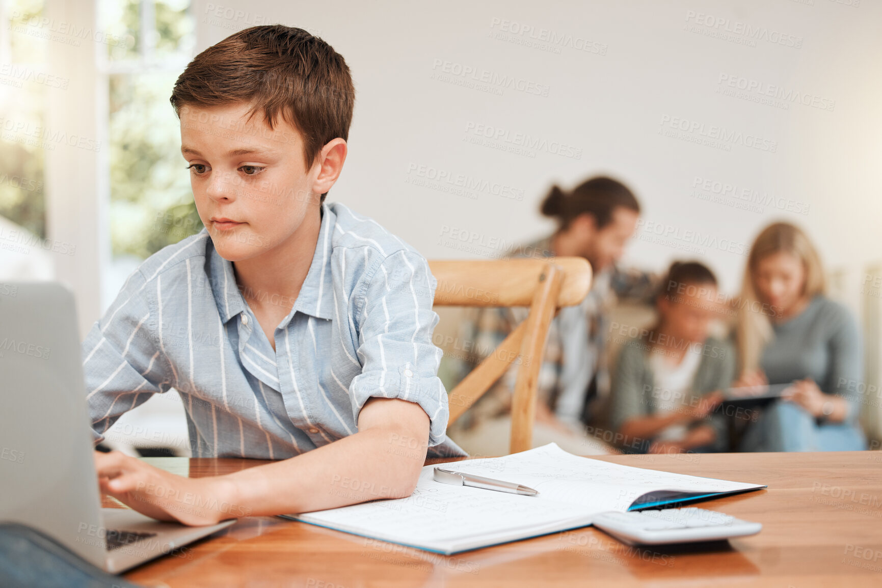 Buy stock photo Boy, laptop and typing with books for homework, elearning or childhood development at home. Student, child or kid with computer for online browsing, study or research on school project or assignment