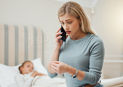 Buy stock photo Shot of a young mother on the phone while taking care of her sick daughter at home
