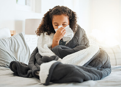 Buy stock photo Sick girl, bed and blowing nose with tissue for virus, cold or flu from allergy, symptoms or infection at home. Female person, child or kid with blanket for influenza, sneeze or fever from sinus