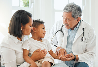 Buy stock photo Mom, child and doctor with checkup for pulse, exam or test on health, flu or symptoms at home. Mother, kid or young son with cardiologist for consultation, medical care or visit on heart beat or rate