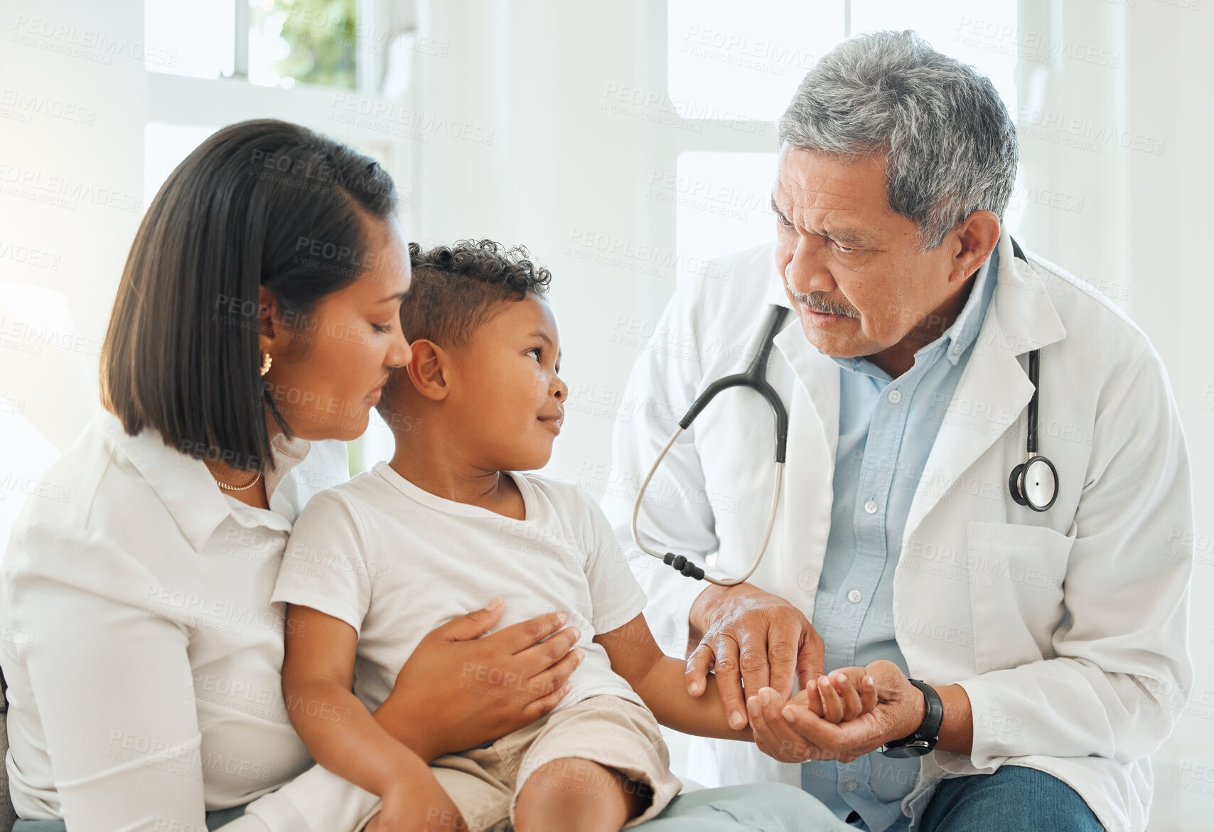 Buy stock photo Mom, child and doctor with checkup for pulse, exam or test on health, flu or symptoms at home. Mother, kid or young son with cardiologist for consultation, medical care or visit on heart beat or rate