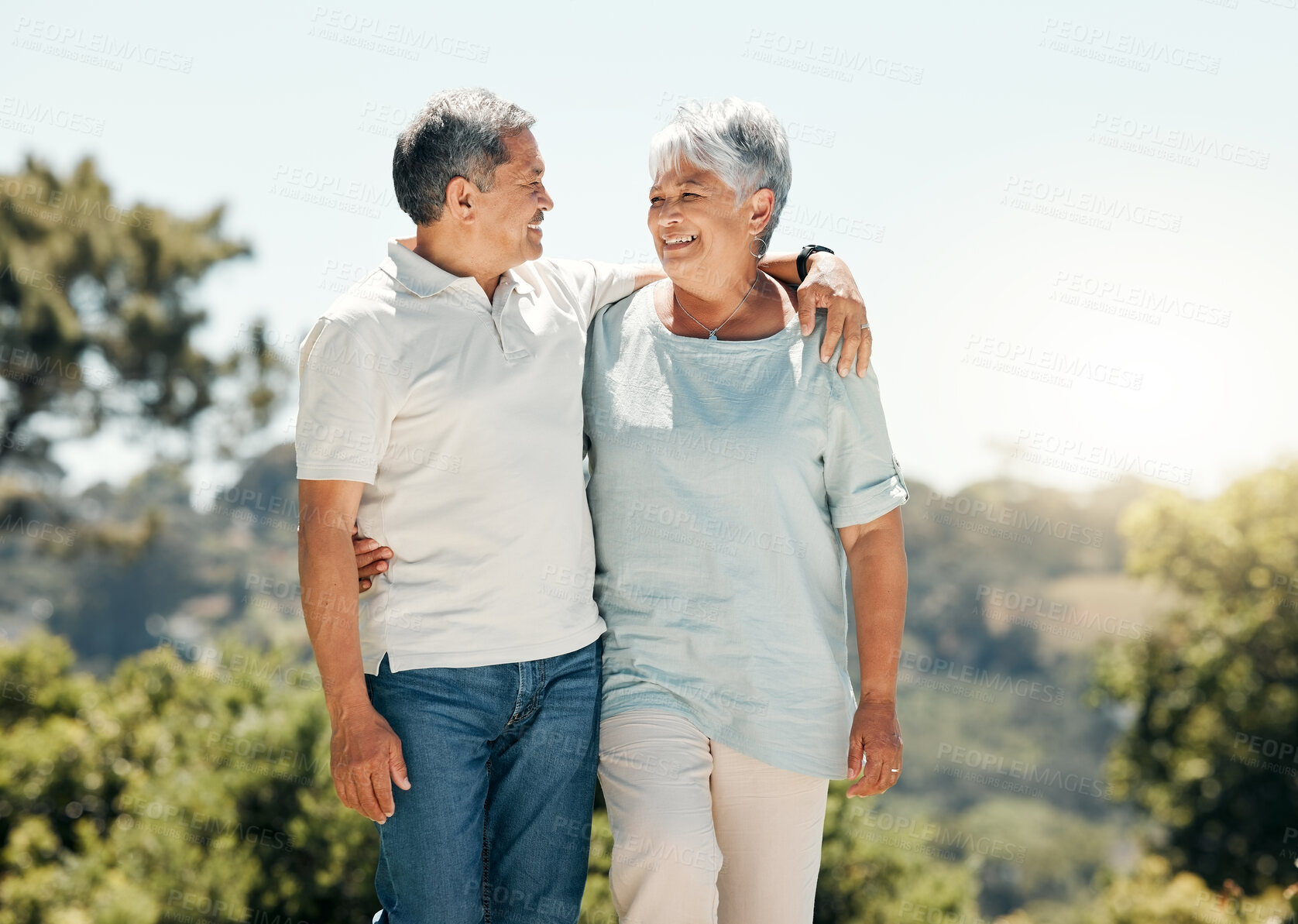 Buy stock photo Hug, senior couple and smile in nature on vacation, holiday or summer bonding. Love, hugging and retirement of man and woman with happiness and enjoying quality time together on romantic date mockup.