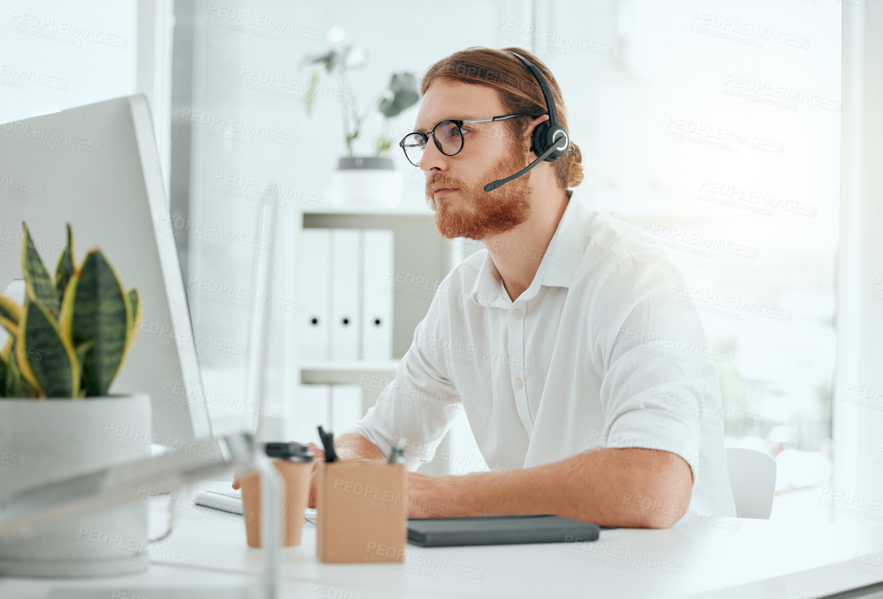 Buy stock photo Call center, man and consultant with headset on computer for customer service, technical support and online advice. Telemarketing, agent and help desk operator with microphone for assistance or CRM