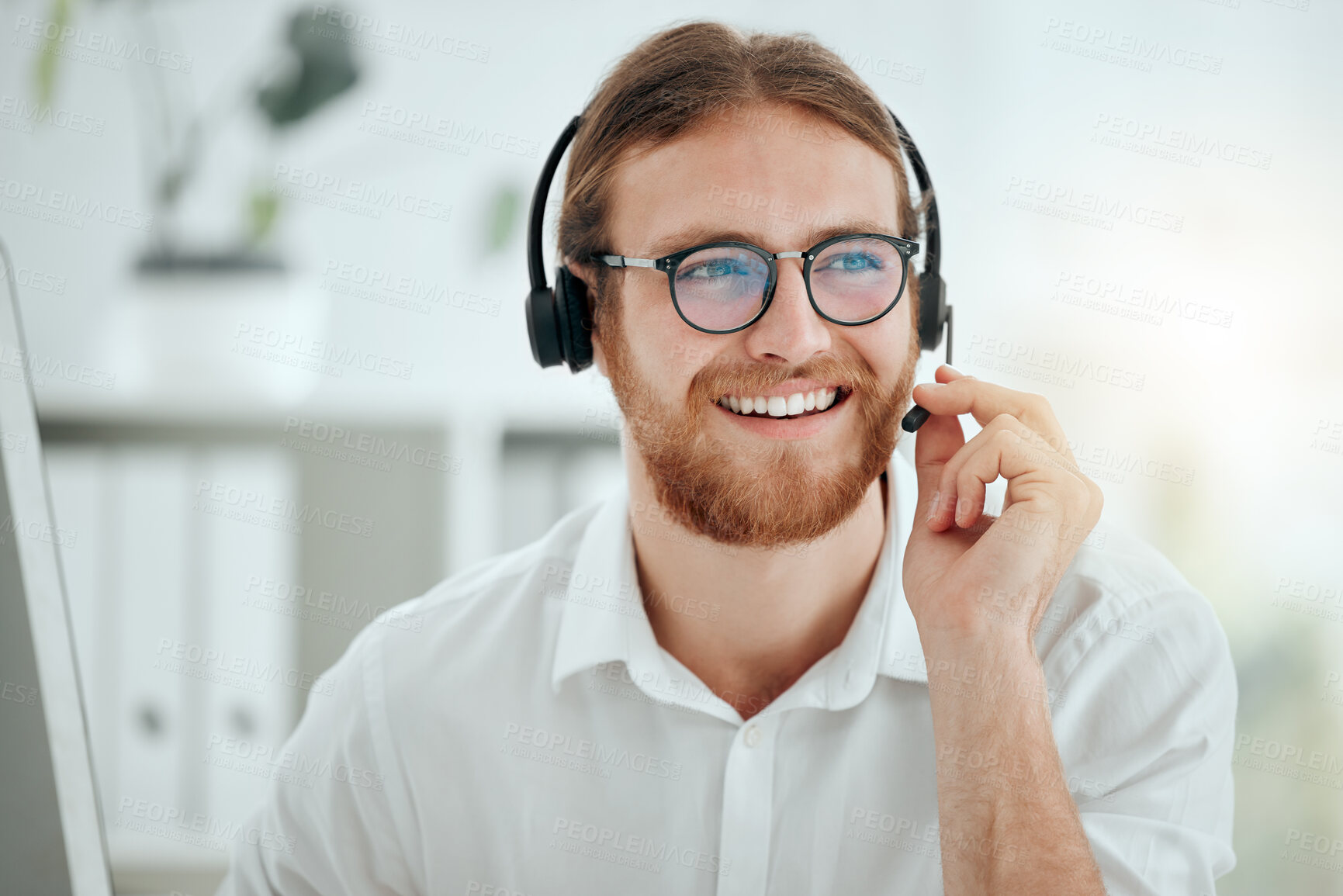 Buy stock photo Call center, man and agent with headset talking to client for customer service, technical support and advice. Telemarketing, friendly consultant and help desk operator with microphone for assistance