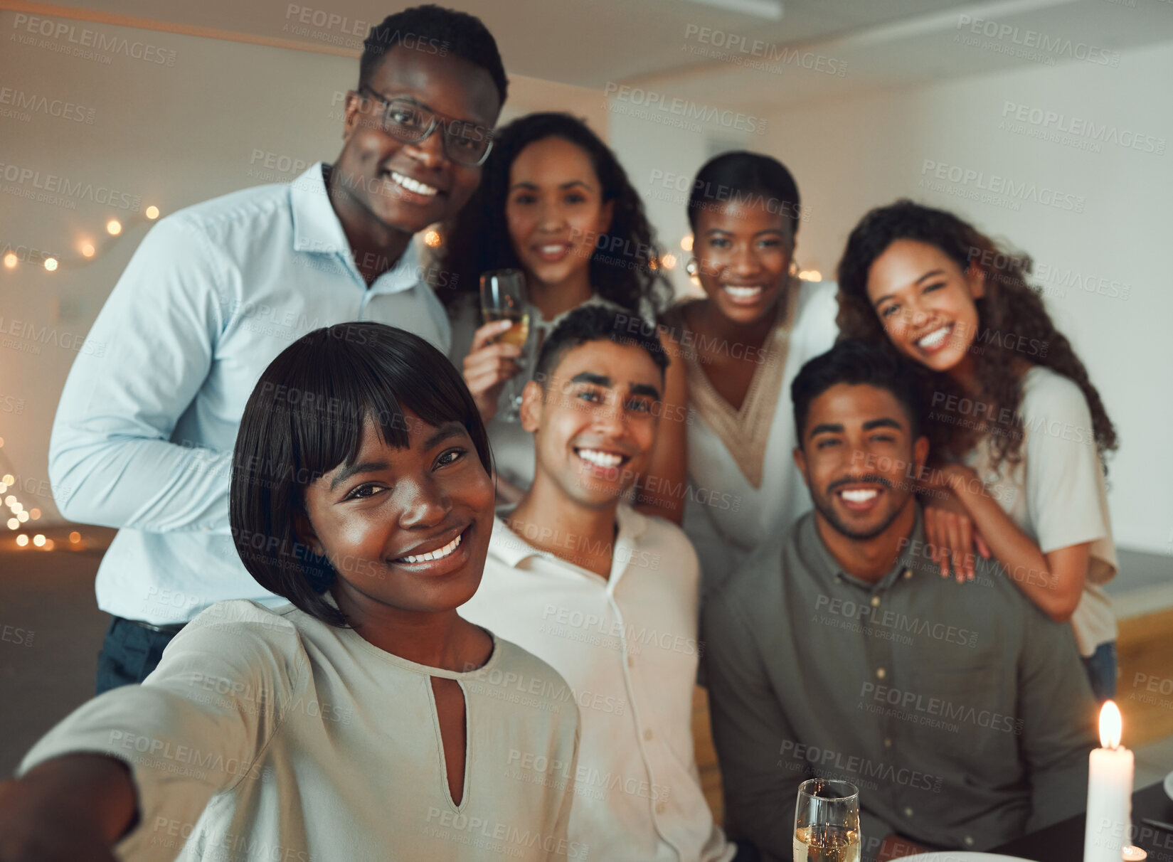 Buy stock photo Shot of business friends enjoying a social gathering together inside