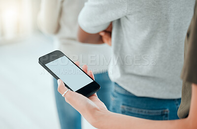 Buy stock photo Cropped shot of an unrecognisable woman standing and using her cellphone during therapy