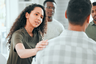 Buy stock photo Counseling, woman with hand on man shoulder for comfort and in support center with members. Mental health or depression, group therapy or rehabilitation and people sitting together for recovery
