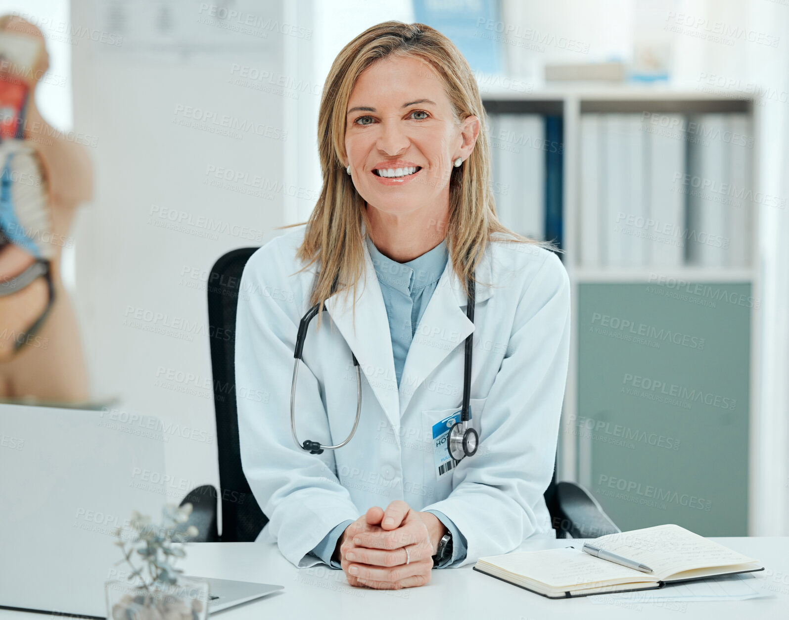 Buy stock photo Portrait, doctor and happy woman in hospital office for healthcare service or medicine on laptop. Face, medical professional and smile of mature expert, surgeon and confident cardiologist in Ireland