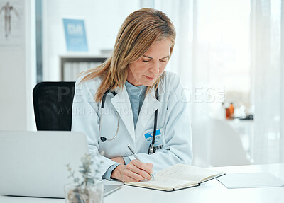 Buy stock photo Doctor, book and writing in office for healthcare, notes and tracking patient treatment plan. Schedule, mature cardiologist and journal in practice for planning, research and medical observation