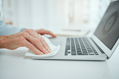 Buy stock photo Hands, tissue and person wipe laptop for sanitizing, hygiene or healthcare routine in office. Technology, disinfection and closeup of employee clean computer for dirt, germs or bacteria in workplace.