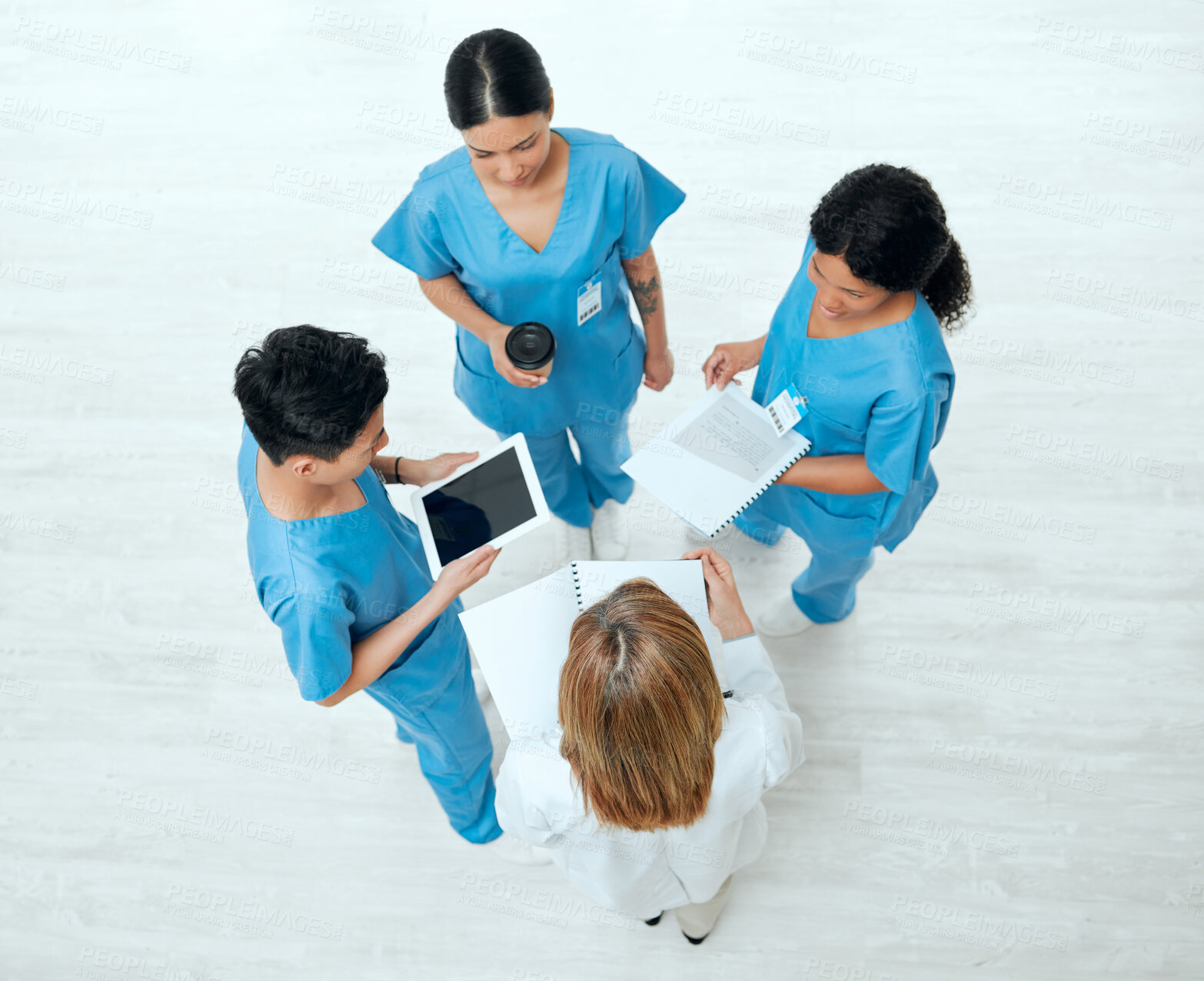 Buy stock photo Teamwork, tablet or above of doctors in meeting planning a surgery strategy in collaboration together. Top view of healthcare nurses talking or speaking of online news reports, feedback or research 