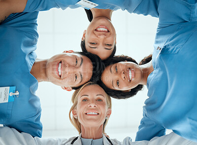 Buy stock photo Diversity, teamwork or faces of nurses in huddle with a happy smile collaboration for healthcare goals. Trust, team building or low angle of medical doctors with group support, motivation or mission