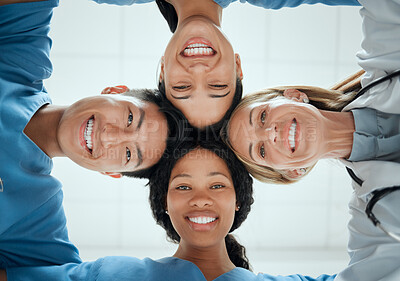 Buy stock photo Portrait, teamwork or faces of doctors in huddle with a happy collaboration for healthcare diversity. Smiling, team building or low angle of medical nurses with group support, motivation or mission