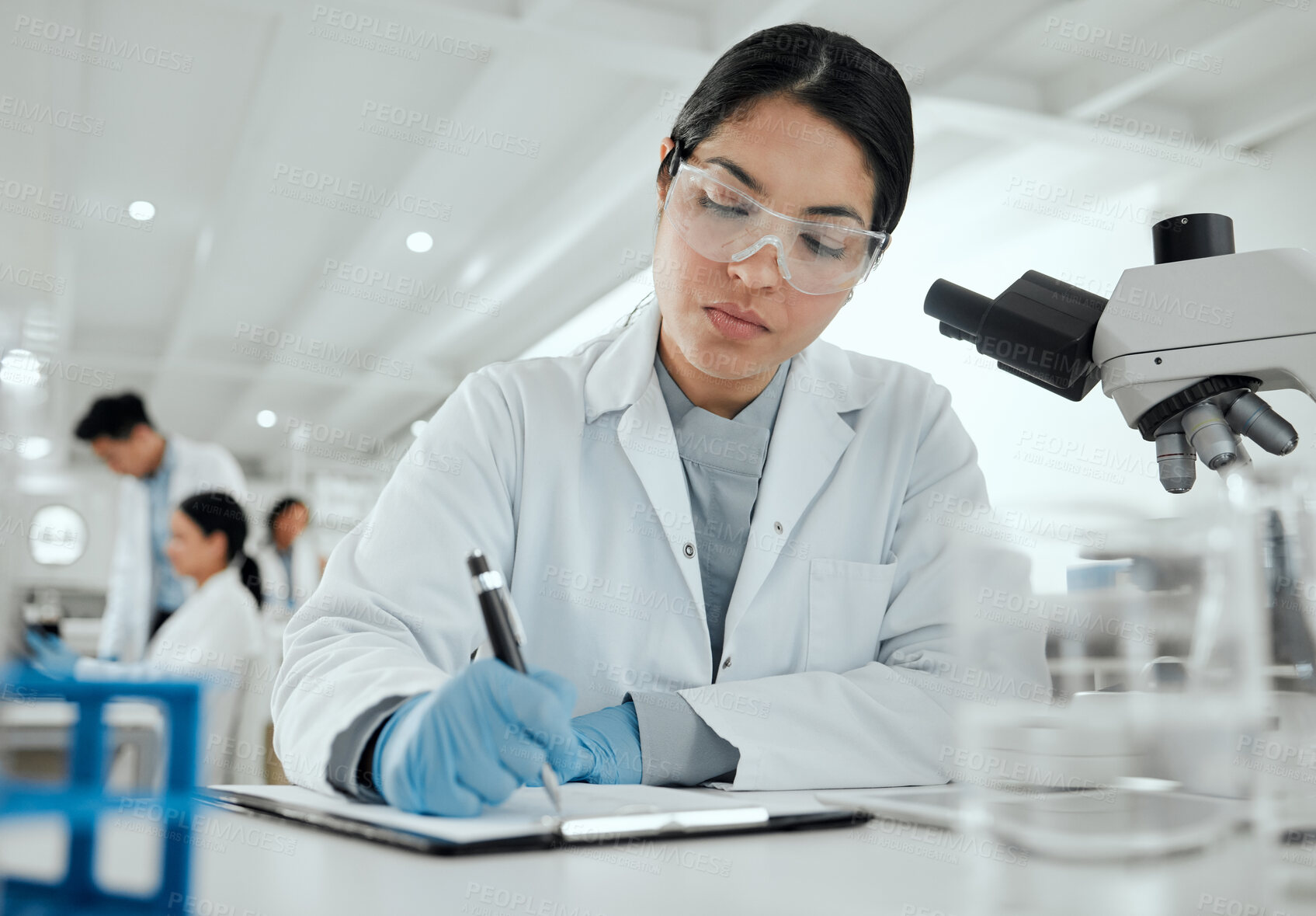 Buy stock photo Laboratory, woman and scientist with clipboard for notes, writing treatment and planning for experiment. Healthcare, female expert or doctor with analysis for study test, checklist and medical report