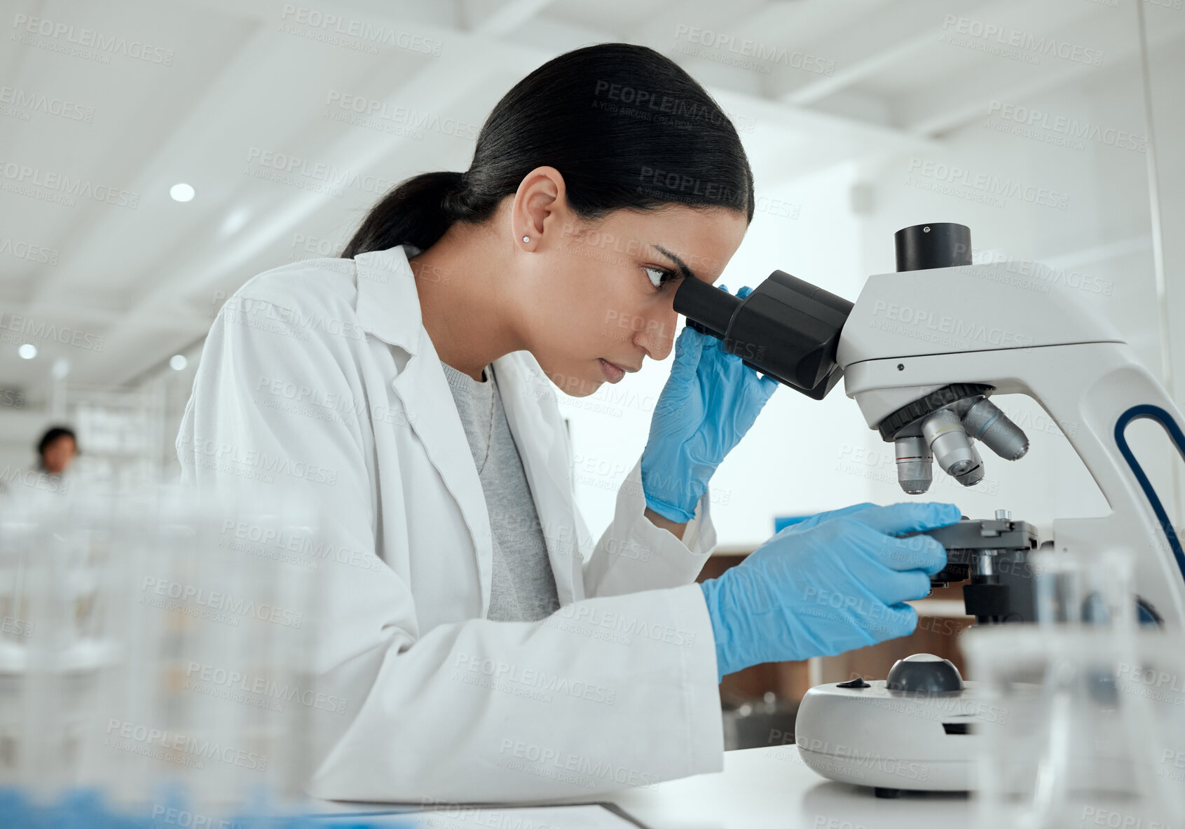 Buy stock photo Woman, microscope and science in lab for chemistry, observation and experiment results. Scientist, tech and study at table for medicine engineering, pharmaceutical research and healthcare innovation