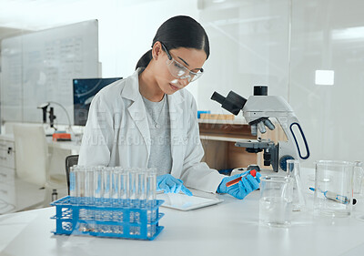 Buy stock photo Laboratory, woman and test tube with tablet for research, medicine information and notes for treatment. Clinic, female expert or scientist with sample for medical study, diagnosis or digital analysis