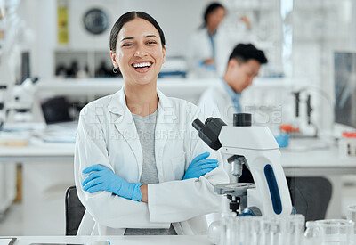 Buy stock photo Shot of a beautiful young scientist in her lab