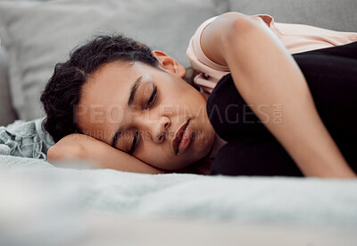 Buy stock photo Shot of an exhausted female sleeping through depression at home