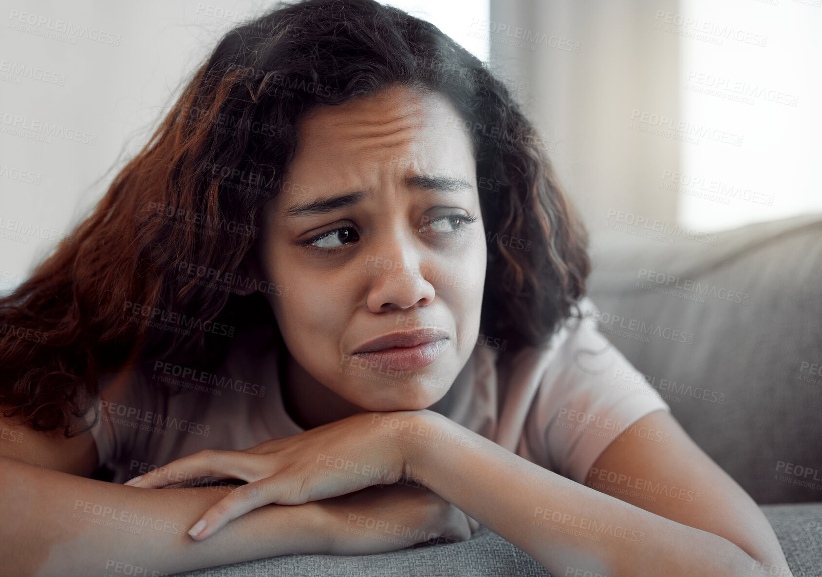 Buy stock photo Woman, depression and crying for sad, mental health and trauma in house with insomnia, grief and loss. Female person, anxiety and fatigue for burnout, pain and broken heart in apartment with sorrow 