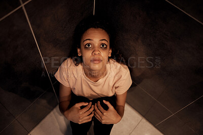 Buy stock photo Shot of a young female experiencing internal turmoil in the bathroom at home