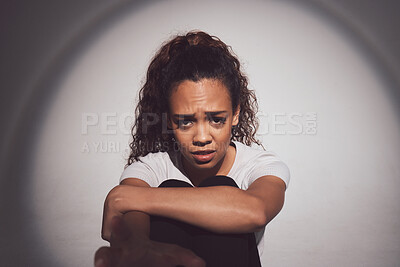 Buy stock photo Girl, sad and depression in portrait with anxiety, pain or mental health on studio background. Female person, bipolar disorder and emotional with crying for care, therapy and healing in grief or loss