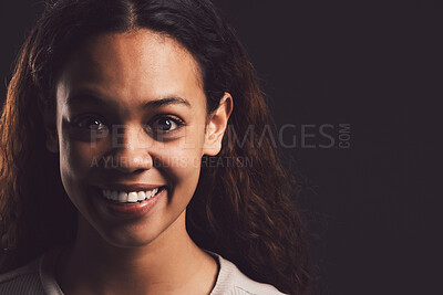 Buy stock photo Smile, portrait and person with bipolar disorder in studio for mental health, psychology and ptsd illness. Identity crisis, mockup and schizophrenia with woman on black background for mood swing 