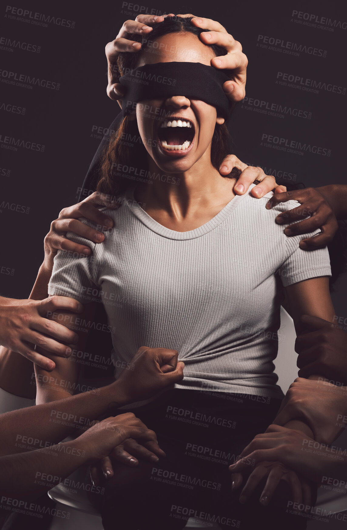 Buy stock photo Woman, screaming and victim with hands or blindfold for kidnapping, robbery or hostage on a dark studio background. Frustrated, female person or shouting for trauma, abuse or captive with emotion