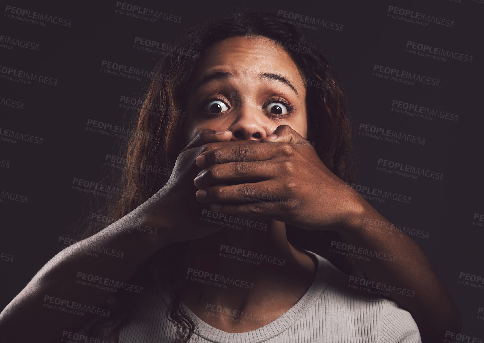 Buy stock photo Portrait, hands and covering mouth in abuse, anxiety or fear for mental health or domestic violence. Female person, struggle and silence in cry for help in therapy, care or support on dark background