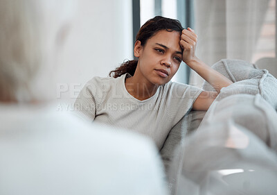 Buy stock photo Woman, therapist and sad patient thinking of mental health crisis, abuse and anxiety in consultation. Psychology session, counseling and girl with stress, depression and remember trauma in office