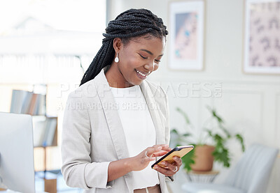Buy stock photo Black woman, typing and phone for business communication, chat and social media post in office. Happy african female entrepreneur reading email or review on smartphone app with network connection