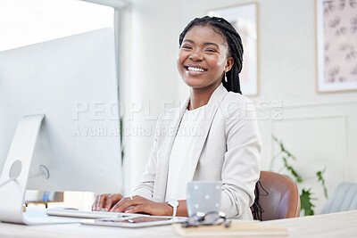 Buy stock photo Happy, portrait of businesswoman typing and computer at her desk in a modern workplace office. Online communication, networking and African female accountant writing an email on pc at her workstation