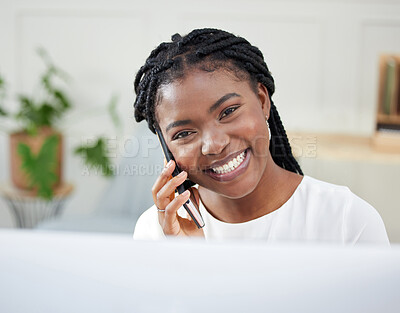 Buy stock photo Shot of a confident young businesswoman using her smartphone to make a phone call