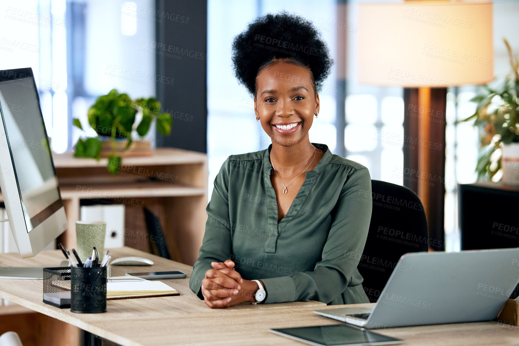 Buy stock photo Portrait of happy black woman at desk with computer, smile and African entrepreneur with pride and tech. Confident businesswoman in office, small business startup and ceo at online management agency.