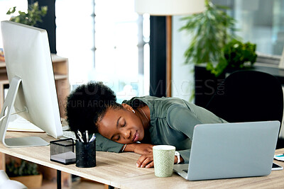 Buy stock photo Shot of a young businesswoman taking a nap at work