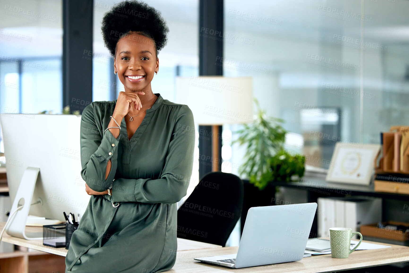 Buy stock photo Portrait of confident black woman in modern office with smile, computer and African entrepreneur with pride. Happy face of businesswoman at small business startup and female boss at management agency