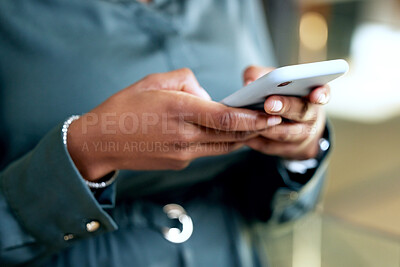 Buy stock photo Shot of an unrecognizable businesswoman using a phone at work