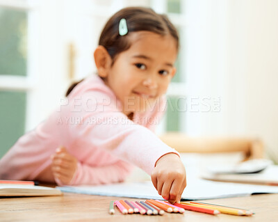 Buy stock photo Cropped portrait of an adorable little girl doing her homework