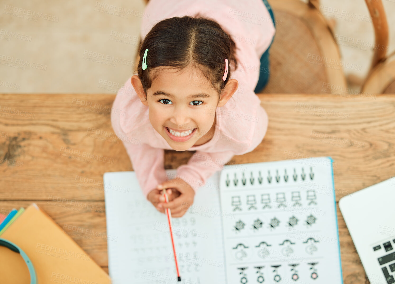 Buy stock photo Portrait, child and homework with laptop for education, elearning and practice with math for kindergarten. Above, girl and cognitive development with studying for knowledge, online class and writing