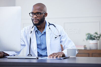 Buy stock photo Black man, serious doctor and computer focus with medical and healthcare research in office. Wellness, hospital and clinic data reading of a African male professional working on tech for health