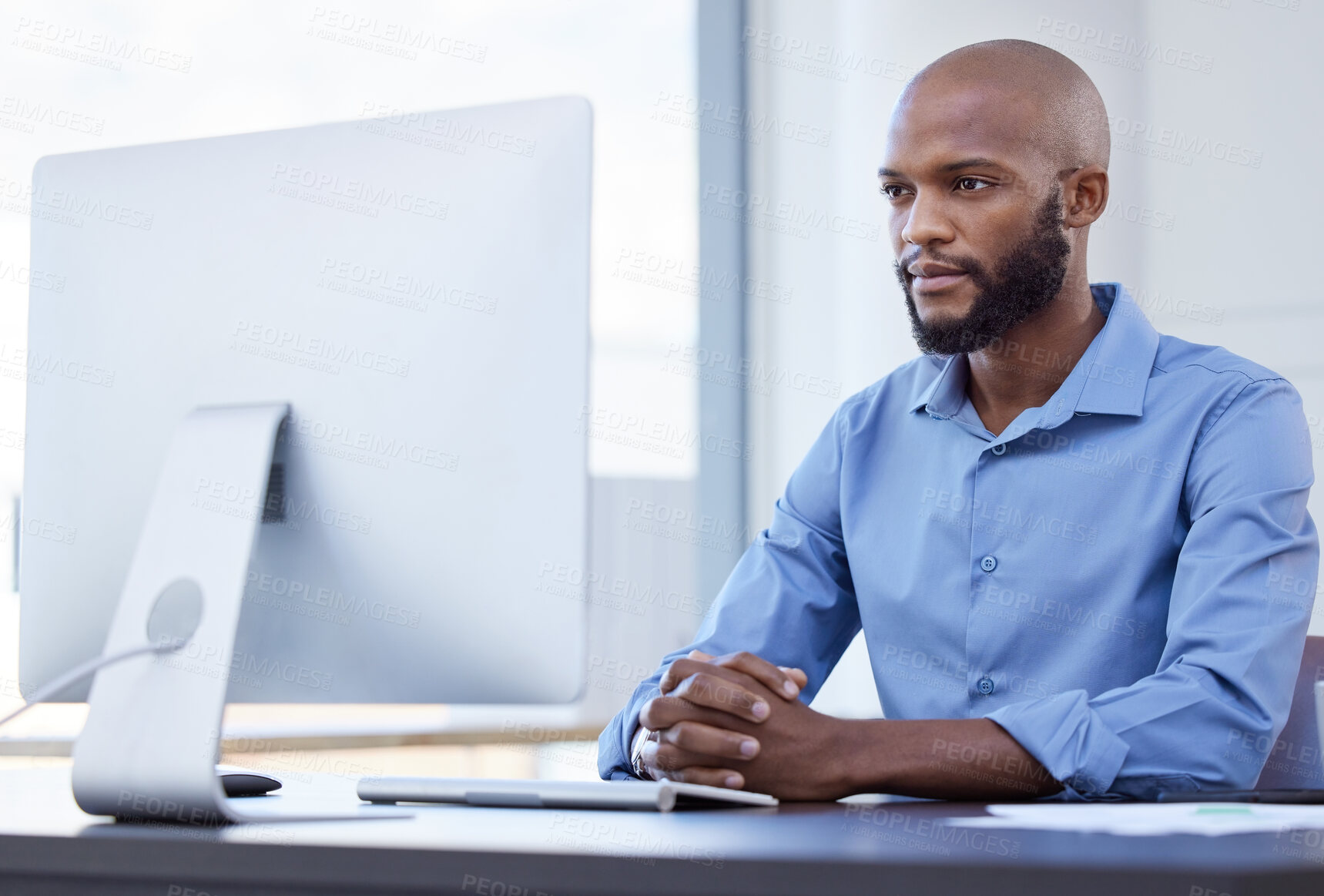 Buy stock photo Businessman, computer and professional for reading, email and office in virtual meeting, work and concentrate. Black man, employee and review while thinking, internet and research on company desktop