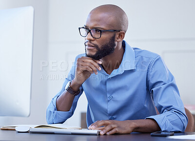 Buy stock photo Black man, office and thinking with computer for online research, information and ideas in start up company. Project manager, notebook and browsing or reading on internet website for business growth