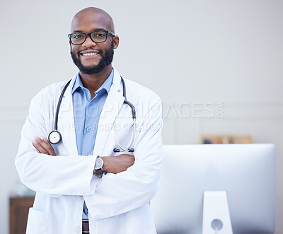 Buy stock photo Doctor, black man and portrait with arms crossed at a hospital with healthcare and wellness success. Face, happiness and medical employee with a African male professional feeling proud with mockup