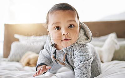 Buy stock photo Portrait, home and baby on a bed, relax and happiness with wellness, playful and rest. Face, male kid and infant in a bedroom, carefree and nurture with newborn, wellbeing and childcare with wellness