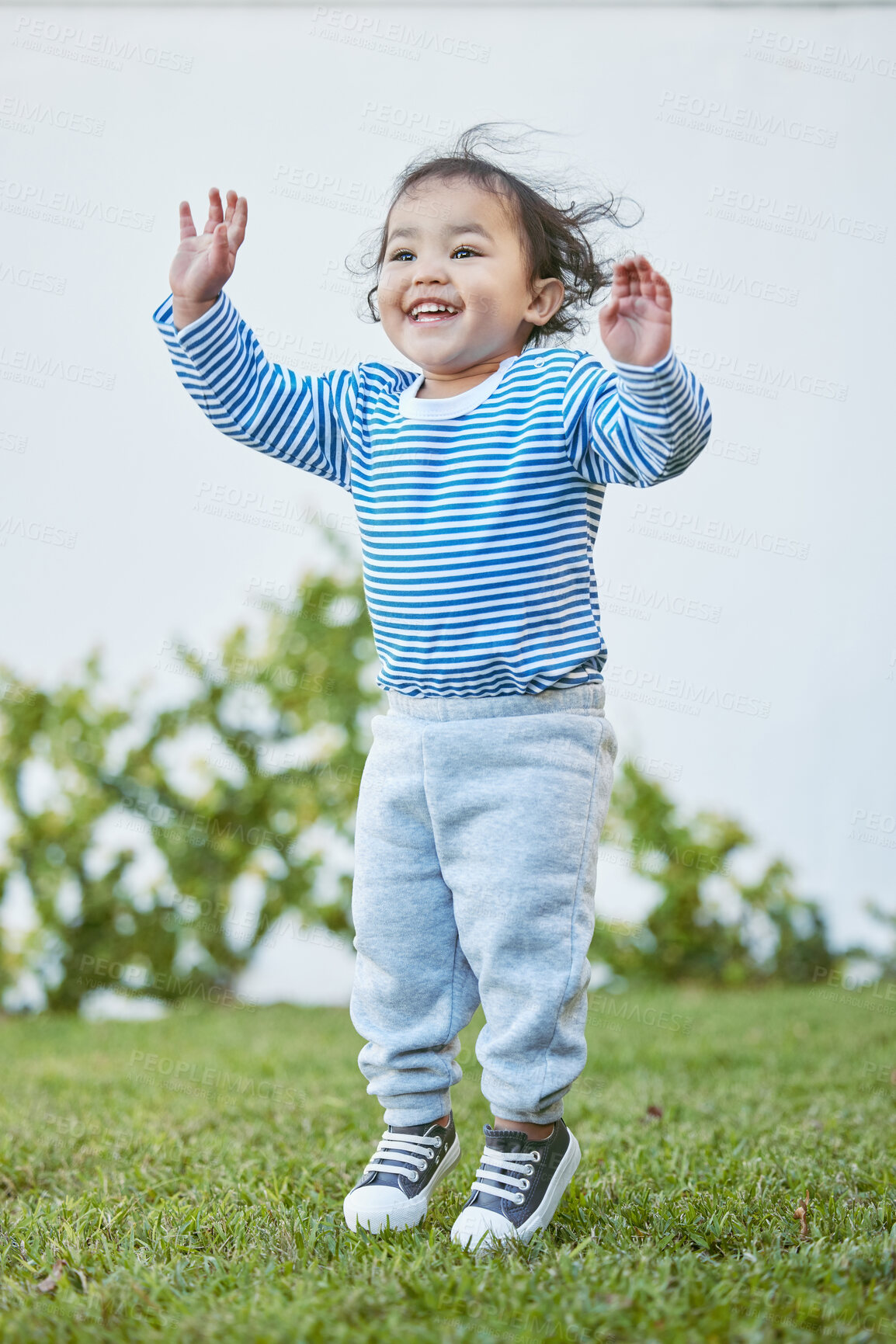 Buy stock photo Backyard, excited and toddler girl with jump for playing, joy and imagination with child for creativity. Outdoor, little kid and happy with energy for games, fun and carefree with entertainment